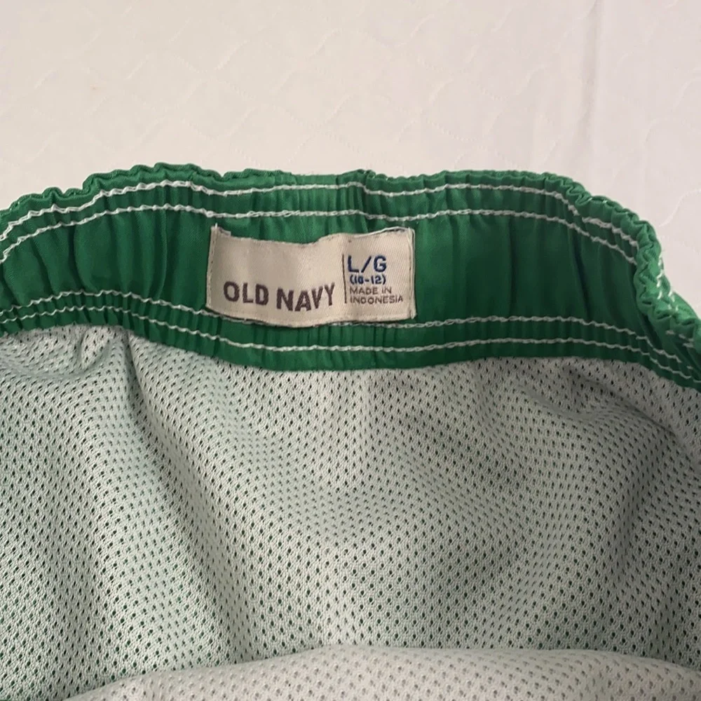 Old Navy green and white swim trunks with pockets